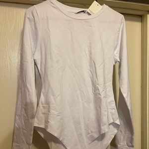Never worn-tag on women’s mango pop white long sleeve leotard top